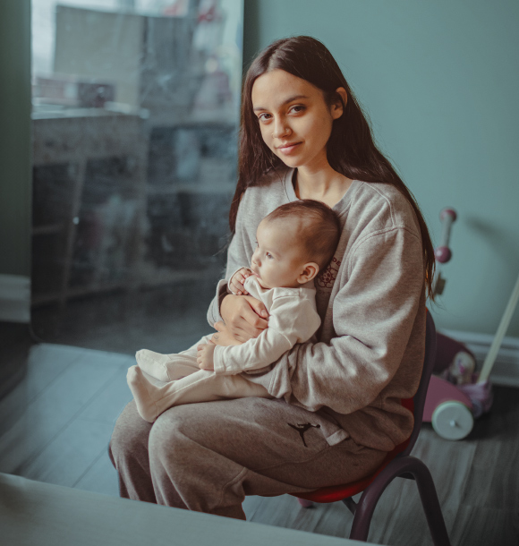 A mother and child at Rose of Sharon